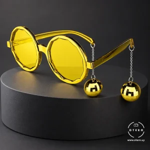 Lentes dorados con bolas de espejos